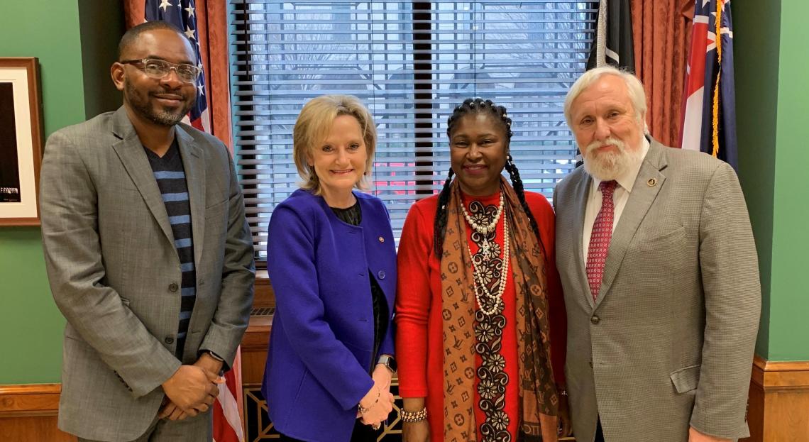 Senator Hyde-Smith visits with representatives of the Fannie Lou Hamer Cancer Foundation